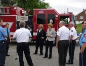 Senator Schwank presents Hereford Volunteer Fire Company with a state flag commemorating the housing.