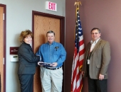 Senator Schwank presents a U.S. flag to Lewis Gable Caernarvon Township Supervisor and Randall Miller Township secretary