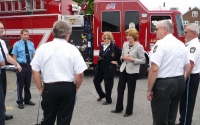 Senator Schwank presents Hereford Volunteer Fire Company with a state flag commemorating the housing.