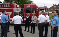 Senator Schwank presents Hereford Volunteer Fire Company with a state flag commemorating the housing.