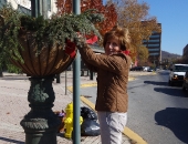 Senator Judy Schwank decorates pole planters on Penn Street, Reading Pa  :: November 12, 2011