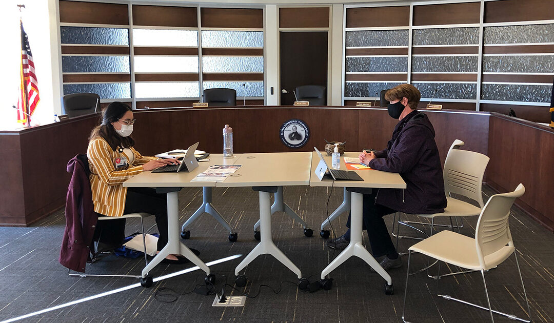 Berks Community Health Center Oakbrook Community Outreach and Enrollment Specialist, Guadalupe Flores, helps a constituent sign up for health insurance during Sen. Judy Schwank and Rep. Mark Rozzi’s ACA Enrollment Event Wednesday.